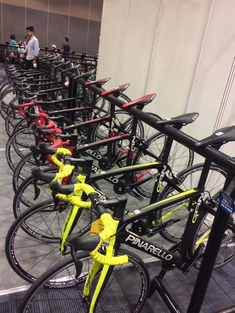 Rows and rows of high-end full-carbon roadbikes that’ll make any cyclist drool.